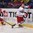 OSTRAVA, CZECH REPUBLIC - MAY 5: Belarus' Artyom Demkov #15 jumps on a loose puck with Denmark's Mads Boedker #4 chasing during preliminary round action at the 2015 IIHF Ice Hockey World Championship. (Photo by Richard Wolowicz/HHOF-IIHF Images)

